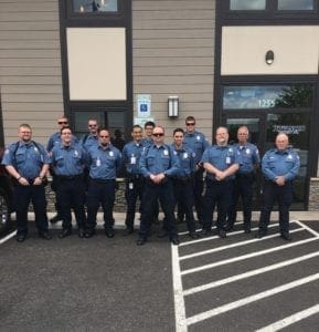 Advanced Security Inc Guards standing together