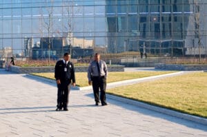 Two security guards patrolling around an office park